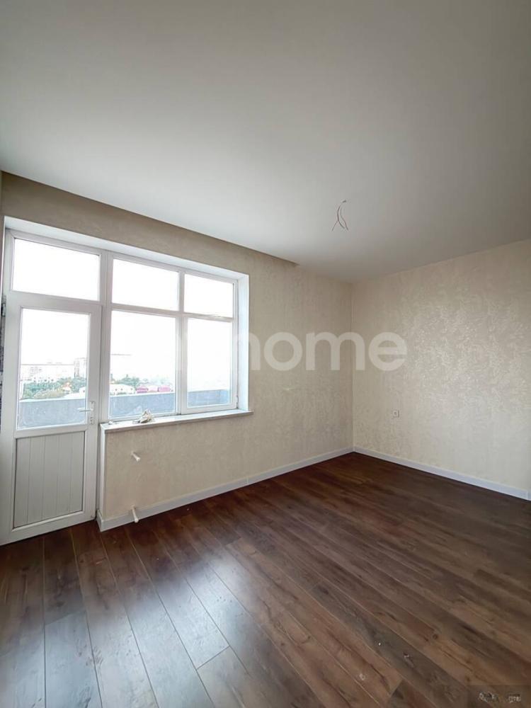  6-cı mikrorayon qəsəbəsində 72m² mənzil satılır